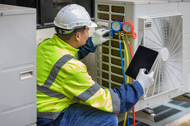 Professional Hvac technician working in Brookville, NY